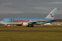 G-BYAA @ EGHH - Thomsonfly.com - by Howard J Curtis