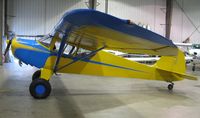 N43339 @ KAXN - Taylorcraft 19 in the hangar. - by Kreg Anderson