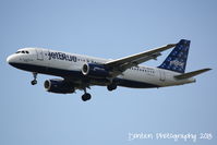 N618JB @ KMCO - JetBlue Flight 1784 Can't Get Enough of Blue (N618JB) arrives at Orlando International Airport following a flight from El Dorado International Airport - by Donten Photography