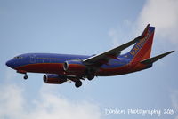 N221WN @ KMCO - Southwest Flight 469 (N221WN) arrives at Orlando International Airport following a flight from Nashville International Airport - by Donten Photography