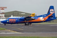 TC-MBE @ EGHH - MNG Kargo - by Howard J Curtis