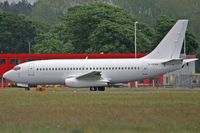 G-CEAH @ EGHH - European Aviation, stripped off all markings other than the registration. - by Howard J Curtis