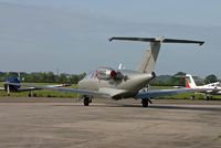 G-PWNS @ EGHH - c/n 525-0153. Hangar 8 Management. - by Howard J Curtis