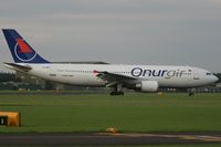 TC-OAO @ EGHH - Onur Air - by Howard J Curtis
