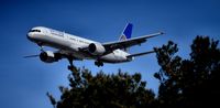 N580UA @ KLAS - Landing 25L - by Michael Mannschreck