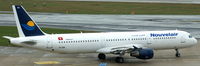 TS-IQA @ EDDL - Nouvelair, is rolling to the runway at Düsseldorf Int´l (EDDL) - by A. Gendorf