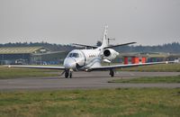 LX-SEH @ EGHH - Taxiing to depart - by John Coates