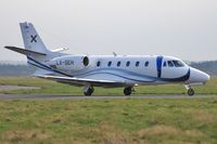LX-SEH @ EGHH - Taxiing to depart - by John Coates
