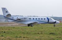 LX-SEH @ EGHH - Taxiing to depart - by John Coates