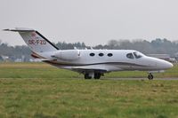 OE-FZD @ EGHH - Taxiing to depart - by John Coates