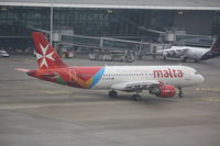 9H-AEK @ EBBR - New livery - by ghans