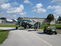 N230ET @ KGIF - Tow bar, golf cart tug and air bottle configuration for operating from Gilbert Field, Winter Haven - by Morane230