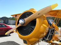 N100BU @ SZP - 1939 Dorniere Werke BU 133 JUNGMEISTER, Lycoming O-360-A1D 180 Hp, original radial cowl, Performance prop a work of art, maintenance panel off - by Doug Robertson