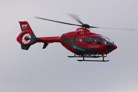 G-WASC @ EGFH - Visiting Wales Air Ambulance (Helimed 59). The Welshpool Airport based mid-Wales air ambulance helicopter departs Swansea Airport after a brief visit. - by Roger Winser