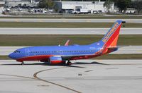 N777QC @ KFLL - Boeing 737-700 - by Mark Pasqualino
