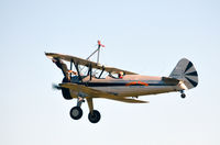 N68853 @ KCJR - Wing walker - Leaning forward on left wing - Flying Circus - Culpeper Air Fest 2012