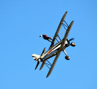 N68853 @ KCJR - Wing walker - standing on top in climb - Flying Circus - Culpeper Air Fest 2012