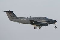 N46L @ EGSH - US Army Beech 200 about to touch down at Norwich. - by Graham Reeve