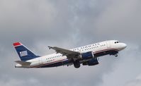 N725UW @ KFLL - Airbus A319 - by Mark Pasqualino