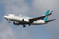 C-FWAO @ MCO - West Jet 737-700 - by Florida Metal
