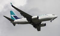 C-FWCN @ MCO - West Jet 737 - by Florida Metal