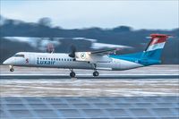 LX-LGN @ EDDR - DHC-8-402Q, - by Jerzy Maciaszek