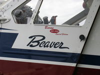 N233N @ SZP - 1956 DeHavilland (Canada) DHC-2 Mk 1 BEAVER, Baron MK2000 Special Edition, P&W R-985 Wasp Jr. 450 Hp radial, logo on pilot's door - by Doug Robertson