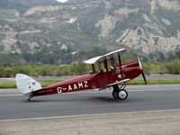 N60MZ @ SZP - 1930 DeHavilland DH.60G GIPSY MOTH, DeHavilland GIPSY II four cylinder in-line inverted air-cooled 120 Hp, S-turns taxi back to hangar ramp, too much crosswind? - by Doug Robertson