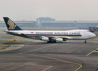 9V-SFM @ AMS - Taxi to the Cargo gate of Schiphol Airport - by Willem Göebel