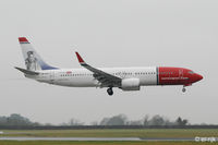 LN-NOJ @ EIDW - Landing Rwy 10 at Dublin in the rain..