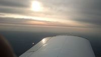 N180E - On the flight home after purchase. 
South Carolina sunrise. - by dms65aaf