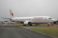 N248SY @ EGHH - ex VH-TJM arrives from Budapest and is towed to paintshop - by John Coates