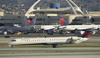 N816SK @ KLAX - Taxiing to gate - by Todd Royer