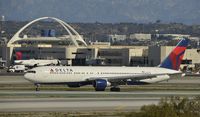 N143DA @ KLAX - Taxiing to gate at LAX - by Todd Royer