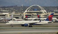 N665DN @ KLAX - Taxiing to gate at LAX - by Todd Royer
