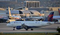 N324NB @ KLAX - Taxiing to gate - by Todd Royer