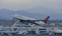 N121DE @ KLAX - Early morning departure from LAX - by Todd Royer