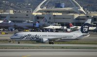 N794AS @ KLAX - Taxiing to gate - by Todd Royer
