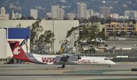 N401QX @ KLAX - Taxiing to gate - by Todd Royer