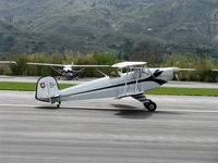 N707S @ SZP - 1947 Slovak Aero Praha G-104 Bucker Jungmann rebuild, Lycoming IO-360 A&C 200 Hp upgrade, Autopilot, forward tandem cockpit faired over, landing roll Rwy 22 - by Doug Robertson