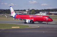 VH-ZPK @ YSCB - Virgin Australia, still in the former Virgin Blue livery, (VH-ZPF) Embraer ERJ-190AR taxiing to the terminal at Canberra Airport. - by YSWG-photography