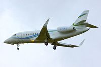 XA-BLZ @ EGCC - Dassault Falcon 2000LX, c/n: 251 about to land at Manchester, UK - by Terry Fletcher