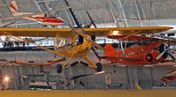 N35773 @ KIAD - This Piper Cub was the first aircraft to be put on display at the Udvar-Hazy Center.  The NASM on the Mall has a Piper J-2 Cub. - by Daniel L. Berek