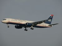 N200UU @ AMS - Landing on runway C18 of Schiphol Airport - by Willem Göebel