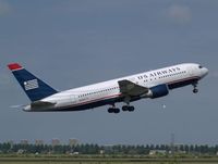 N252AU @ AMS - Take off from runway L36 of Schiphol Airport - by Willem Göebel