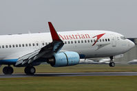 OE-LNQ @ EGHH - Austrian, just about to touch down. - by Howard J Curtis