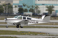 N145JM @ FXE - Waiting for departure on Runway 8 - by Bruce H. Solov