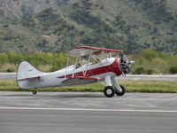N32135 @ SZP - 1941 Waco UPF-7, Continental W670 220 Hp radial, landing roll Rwy 22 - by Doug Robertson