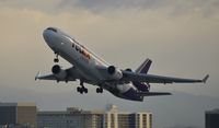 N574FE @ KLAX - Early morning departure from LAX - by Todd Royer
