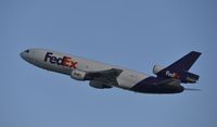 N398FE @ KLAX - Departing LAX - by Todd Royer
